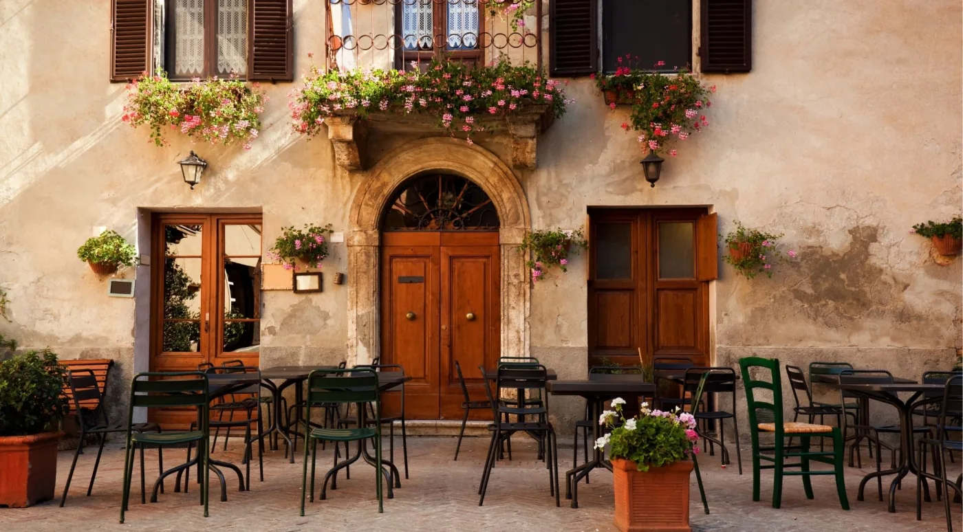 Bologna's historic porticoes and medieval towers — the backdrop for walking tours of the city centre